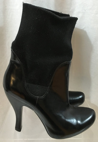 Black BCBG patent leather booties with fabric stretch cuff